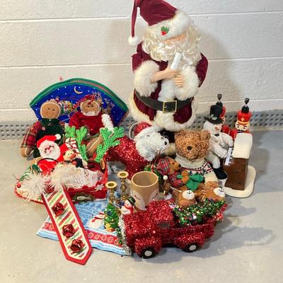 LOT 65: Large Christmas Collection - Mechanical / Musical Santa, Brass Candlestick Holders, Plush Animals, Signs and Much More