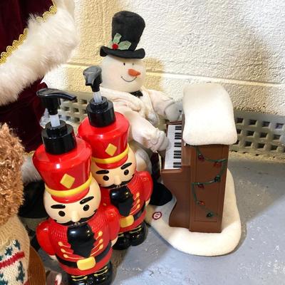 LOT 65: Large Christmas Collection - Mechanical / Musical Santa, Brass Candlestick Holders, Plush Animals, Signs and Much More