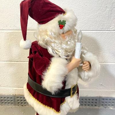 LOT 65: Large Christmas Collection - Mechanical / Musical Santa, Brass Candlestick Holders, Plush Animals, Signs and Much More