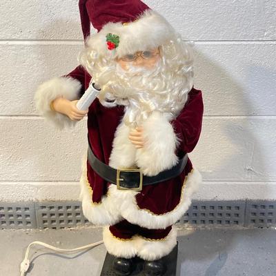 LOT 65: Large Christmas Collection - Mechanical / Musical Santa, Brass Candlestick Holders, Plush Animals, Signs and Much More