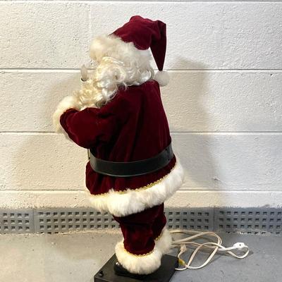 LOT 65: Large Christmas Collection - Mechanical / Musical Santa, Brass Candlestick Holders, Plush Animals, Signs and Much More