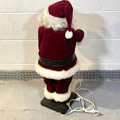 LOT 65: Large Christmas Collection - Mechanical / Musical Santa, Brass Candlestick Holders, Plush Animals, Signs and Much More