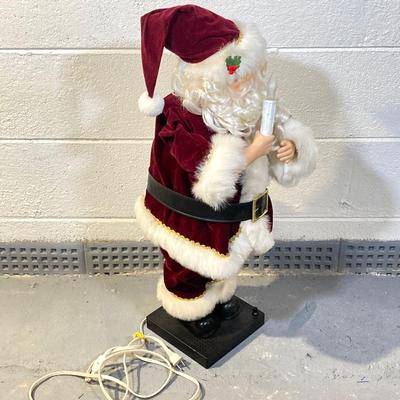 LOT 65: Large Christmas Collection - Mechanical / Musical Santa, Brass Candlestick Holders, Plush Animals, Signs and Much More