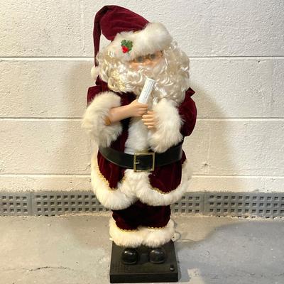 LOT 65: Large Christmas Collection - Mechanical / Musical Santa, Brass Candlestick Holders, Plush Animals, Signs and Much More
