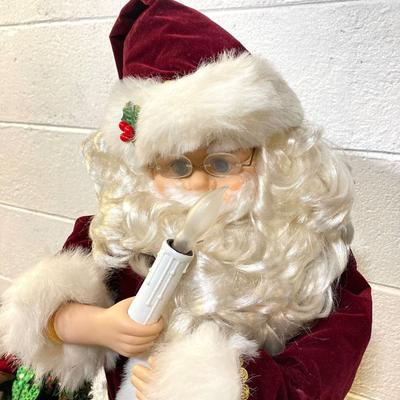 LOT 65: Large Christmas Collection - Mechanical / Musical Santa, Brass Candlestick Holders, Plush Animals, Signs and Much More