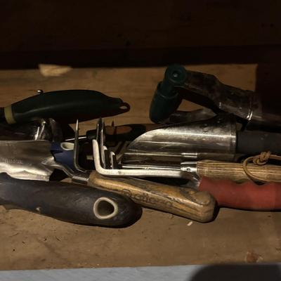 LOT 104: Garage Garden Supplies and More Cabinet Cleanout