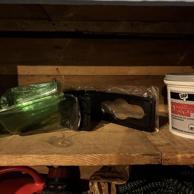 LOT 104: Garage Garden Supplies and More Cabinet Cleanout