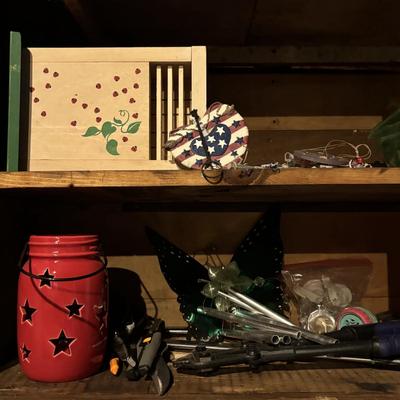 LOT 104: Garage Garden Supplies and More Cabinet Cleanout