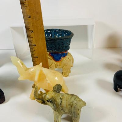 LOT 122: A Large Pack of Elephant Figures Including Etched Shells