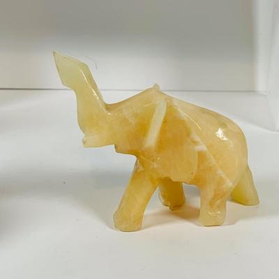 LOT 122: A Large Pack of Elephant Figures Including Etched Shells