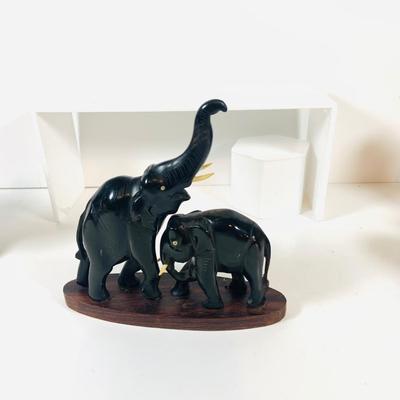 LOT 122: A Large Pack of Elephant Figures Including Etched Shells