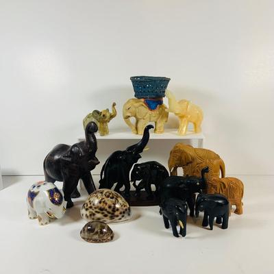LOT 122: A Large Pack of Elephant Figures Including Etched Shells