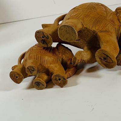 LOT 122: A Large Pack of Elephant Figures Including Etched Shells