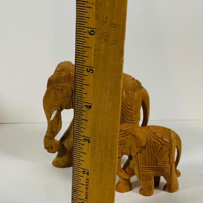 LOT 122: A Large Pack of Elephant Figures Including Etched Shells
