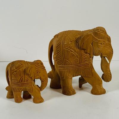 LOT 122: A Large Pack of Elephant Figures Including Etched Shells