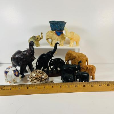 LOT 122: A Large Pack of Elephant Figures Including Etched Shells