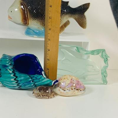 LOT 124: Something Fishy Aquatic Inspired Collection Including a Ceramic Fish Made In Brazil, Art Glass Shell, Two (2) Etched Sea Shells...