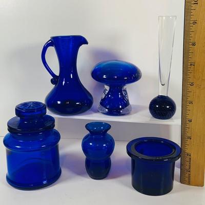 LOT 128: Cobalt Blue Glass Collection Induing a Mushroom Pitcher, Vases and Jar