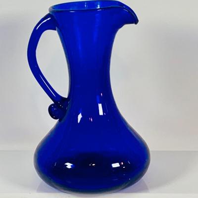 LOT 128: Cobalt Blue Glass Collection Induing a Mushroom Pitcher, Vases and Jar
