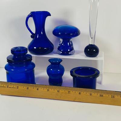 LOT 128: Cobalt Blue Glass Collection Induing a Mushroom Pitcher, Vases and Jar