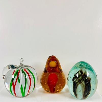 LOT 134: Set of Three (3) Art Glass Paperweights - Red and Green Apple, a Pear and Egg