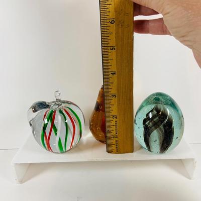LOT 134: Set of Three (3) Art Glass Paperweights - Red and Green Apple, a Pear and Egg