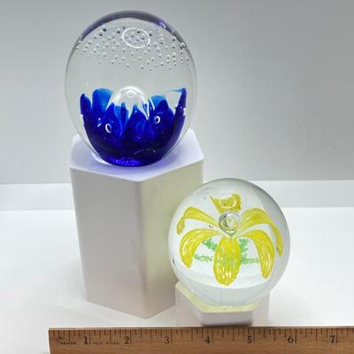 LOT 164: Pair of Glass Paperweights - Yellow Flower and Blue Abstract