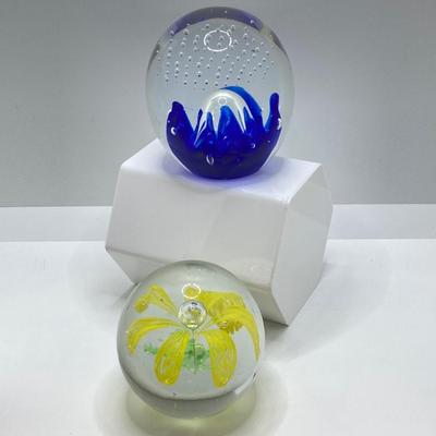 LOT 164: Pair of Glass Paperweights - Yellow Flower and Blue Abstract