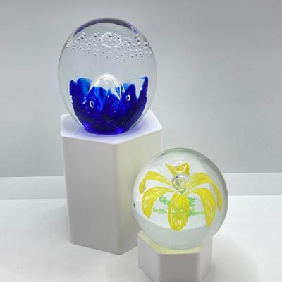 LOT 164: Pair of Glass Paperweights - Yellow Flower and Blue Abstract