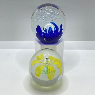 LOT 164: Pair of Glass Paperweights - Yellow Flower and Blue Abstract