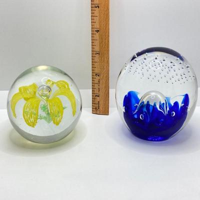LOT 164: Pair of Glass Paperweights - Yellow Flower and Blue Abstract