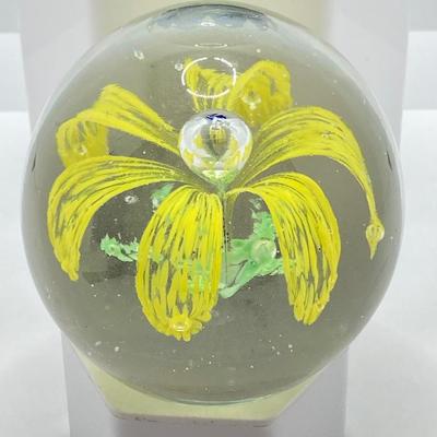 LOT 164: Pair of Glass Paperweights - Yellow Flower and Blue Abstract