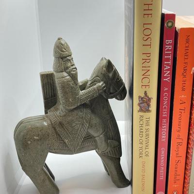 LOT 167: Pair of Carved Stone Bookends with Collection of Books