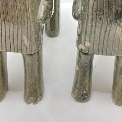 LOT 167: Pair of Carved Stone Bookends with Collection of Books