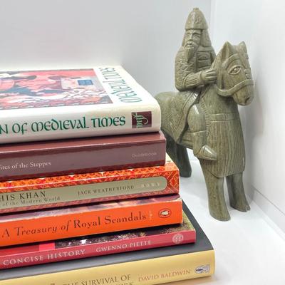 LOT 167: Pair of Carved Stone Bookends with Collection of Books