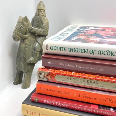 LOT 167: Pair of Carved Stone Bookends with Collection of Books
