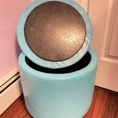 LOT 179: Pair of Pink and Blue Circular Storage Ottomans