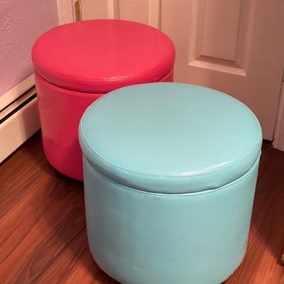 LOT 179: Pair of Pink and Blue Circular Storage Ottomans
