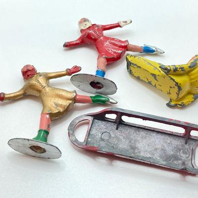 LOT 186: Vintage / Antique Metal Winter Sports Miniature Figurines