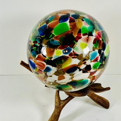 LOT 190: Beautiful Multicolored Blown Glass Orb on Driftwood Base