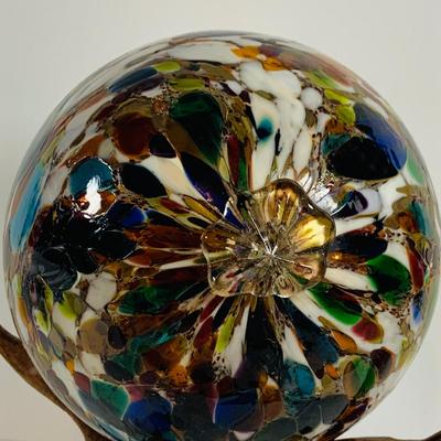 LOT 190: Beautiful Multicolored Blown Glass Orb on Driftwood Base