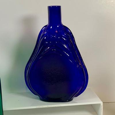 LOT 192: Blenko Glass Bottle, Two (2) Clevenger Bros. Glass Bottles, and a Glass Apple Paperweight