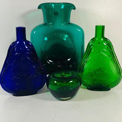 LOT 192: Blenko Glass Bottle, Two (2) Clevenger Bros. Glass Bottles, and a Glass Apple Paperweight