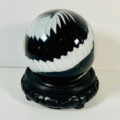 LOT 193: Black and White Paperweight with Wood Base