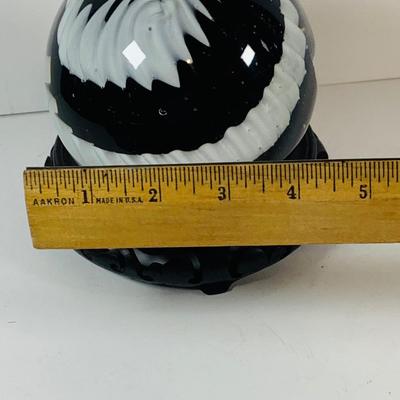 LOT 193: Black and White Paperweight with Wood Base