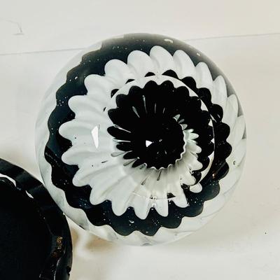 LOT 193: Black and White Paperweight with Wood Base