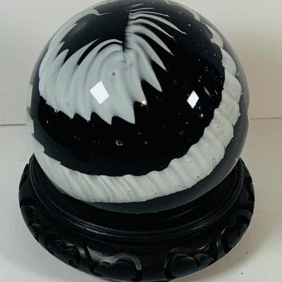 LOT 193: Black and White Paperweight with Wood Base