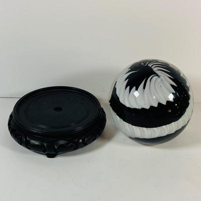 LOT 193: Black and White Paperweight with Wood Base