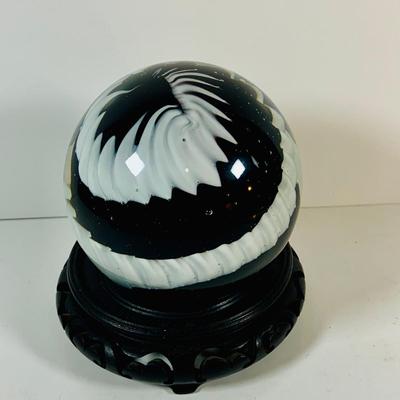 LOT 193: Black and White Paperweight with Wood Base