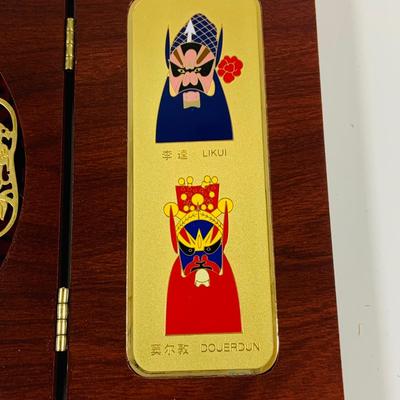 LOT 197: Asia Inspired Collection Including Peking Opera Facial Make-up Plaque, Wooden Figures, Miniture Doll. Buddha's, Dragons and...